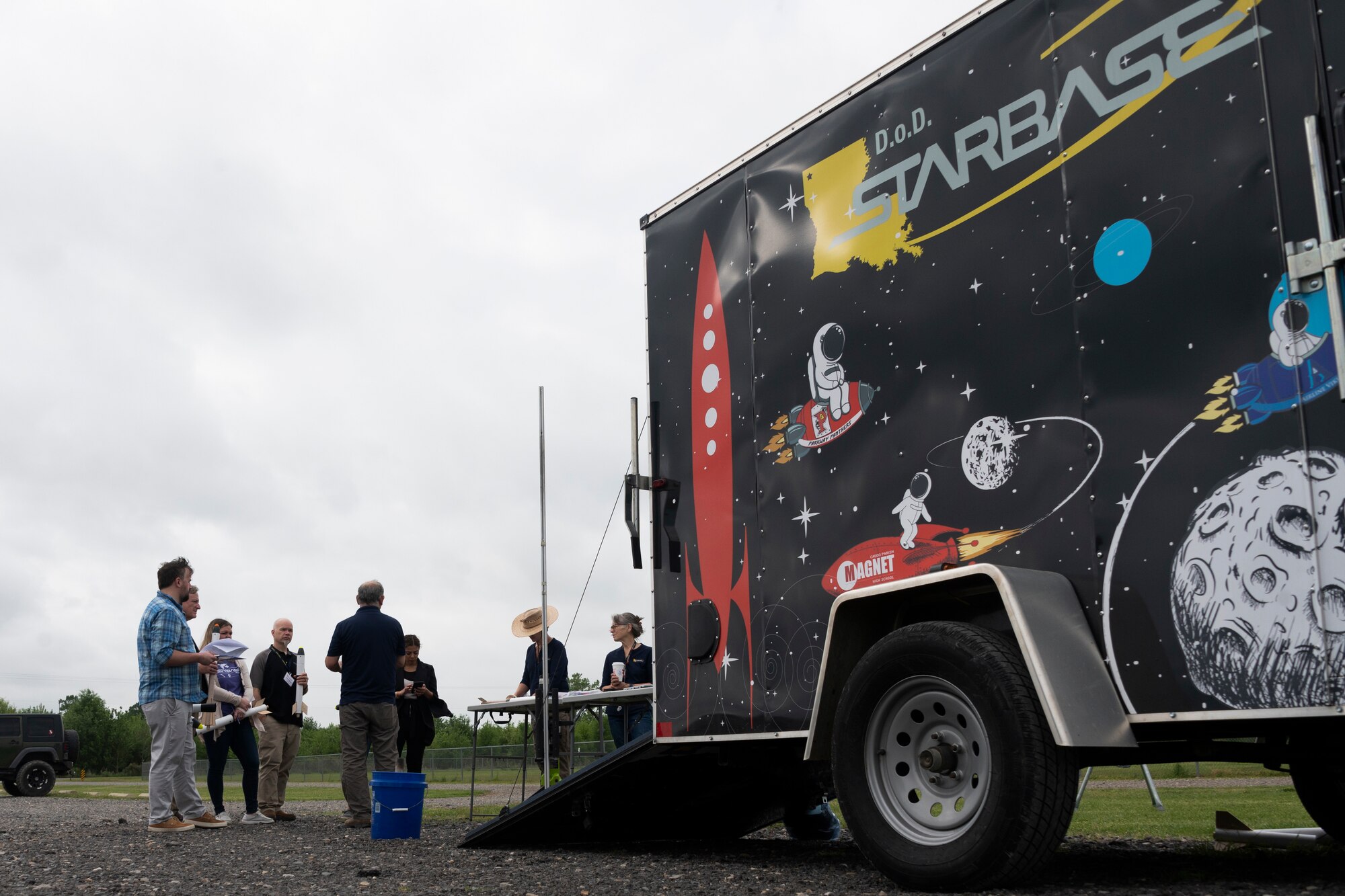 Photo of trailer and people