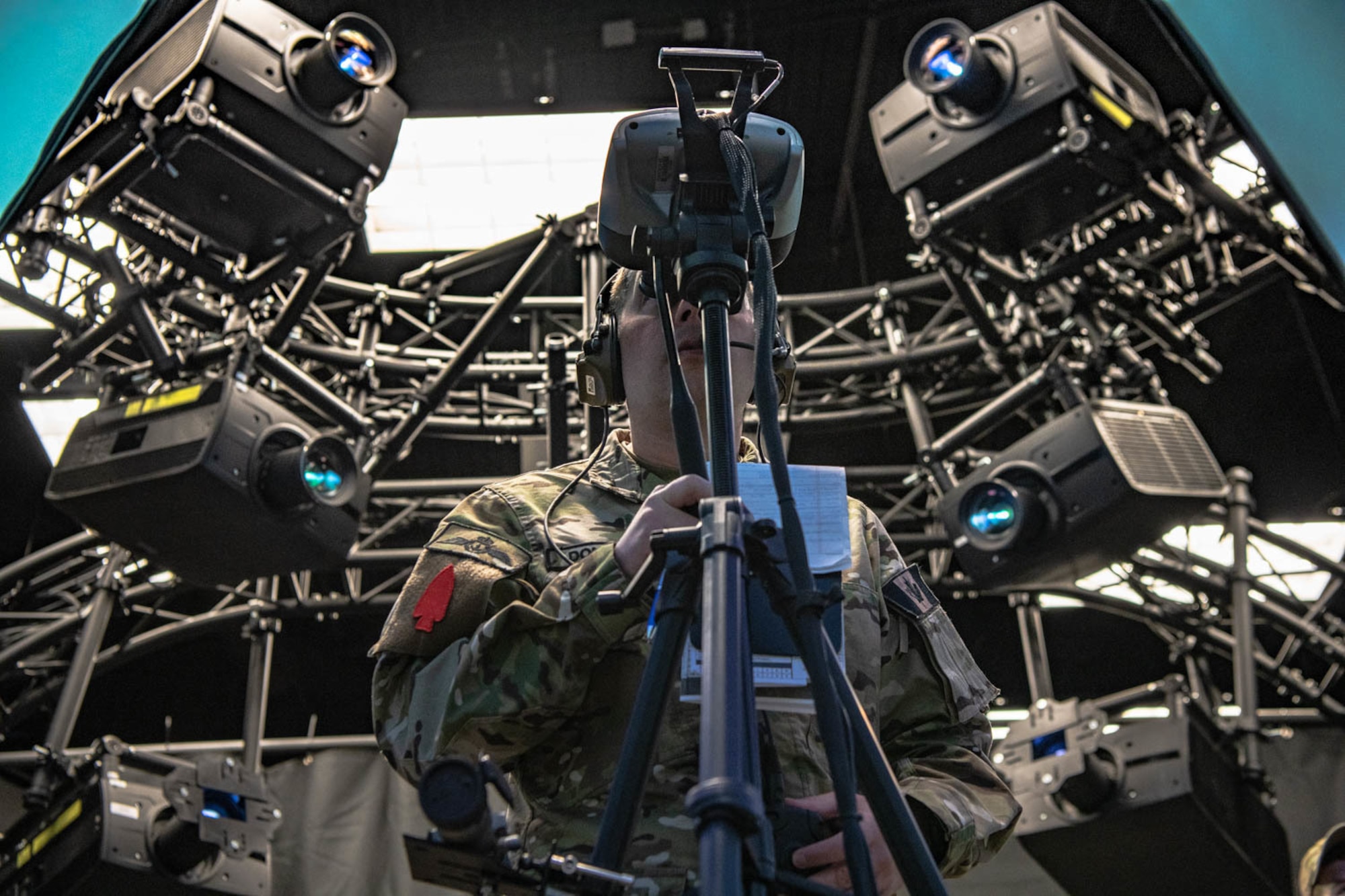 man looks through virtual binoculars
