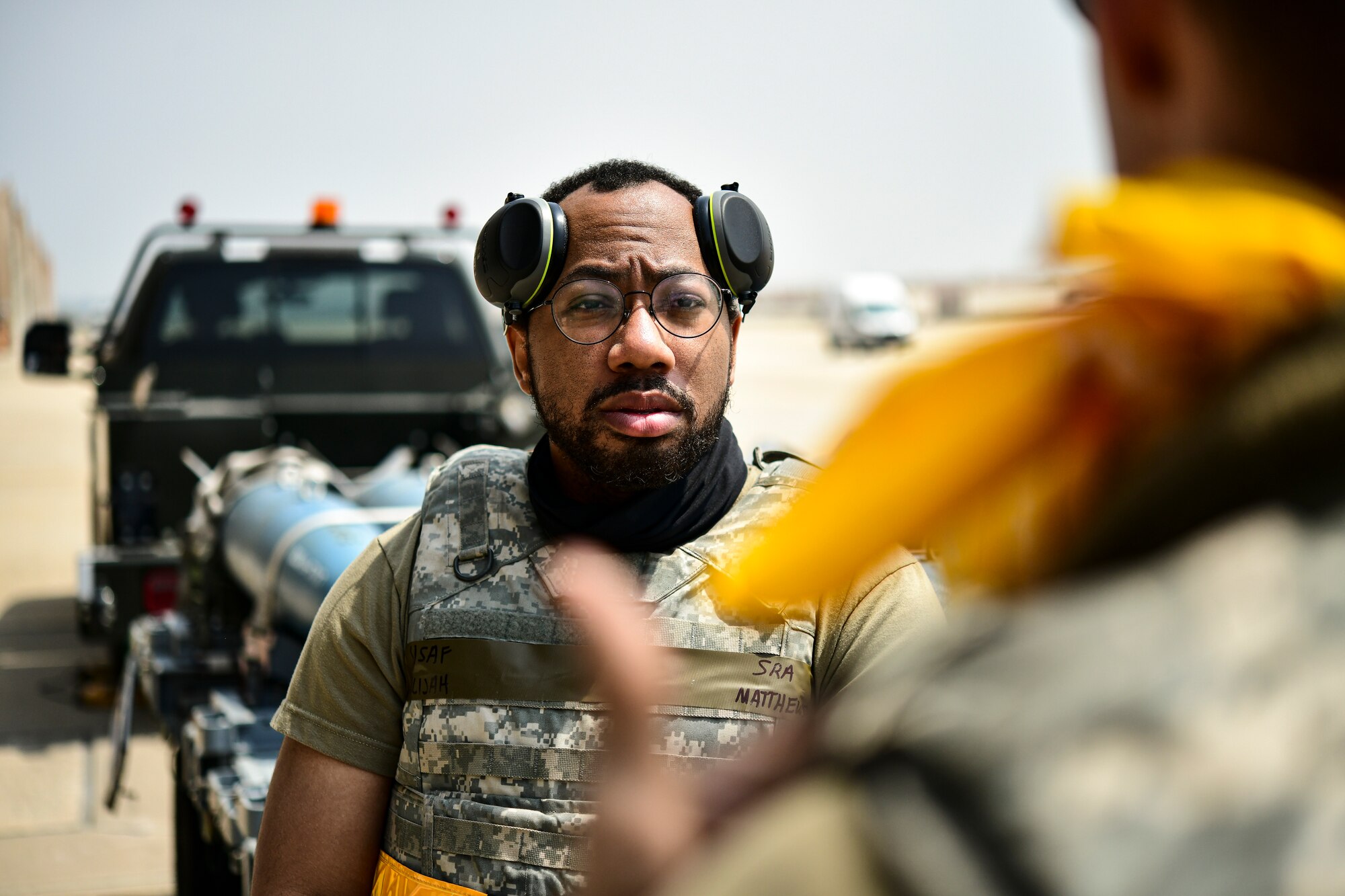 Flight line portraits of weapons and maintenance Airmen.