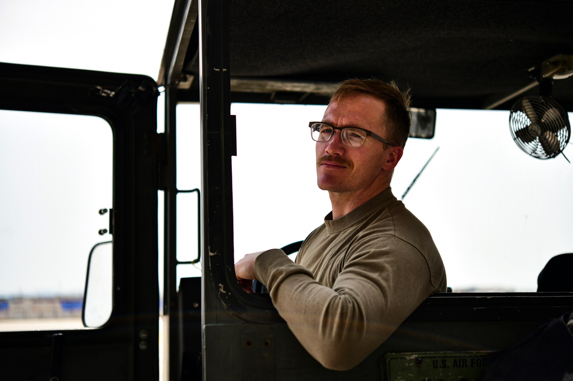 Flight line portraits of weapons and maintenance Airmen.