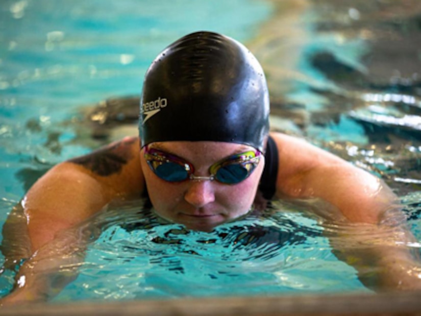 Retired U.S. Army Spc. Angela Euson prepares to compete in the 2022 Invictus Games by training in swimming during the 2022 Invictus Games Team U.S. Training Camp, Fort Belvoir, Virginia, April 11, 2022. Team U.S is a part of more than 500 participants from 20 countries who will take part in The Invictus Games The Hague 2020 featuring ten adaptive sports, including archery, field, indoor rowing, powerlifting, swimming, track, sitting volleyball, wheelchair basketball, wheelchair ruby, and a driving challenge.