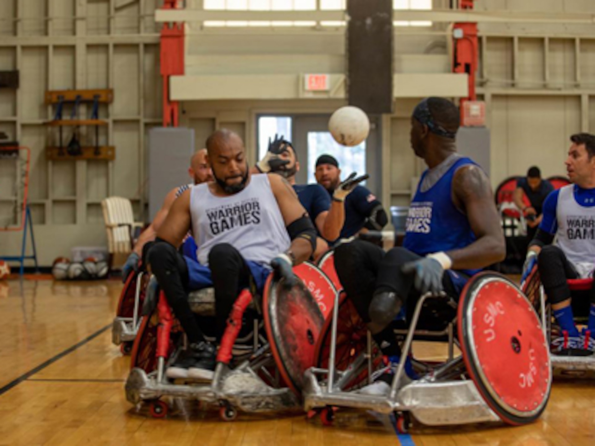 Invictus Games competitors participate in a scrimmage during rugby training April 12, 2022 on Fort Belvoir, VA. Team U.S is a part of more than 500 participants from 20 countries who will take part in The Invictus Games The Hague 2020 featuring ten adaptive sports, including archery, field, indoor rowing, powerlifting, swimming, track, sitting volleyball, wheelchair basketball, wheelchair ruby, and a driving challenge.