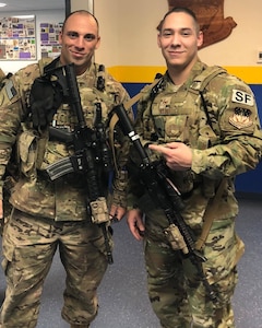 Montana Air National Guard Staff Sgt. Matt Cable, left, a security forces defender and member of the Air Force Wounded Warrior Program, at Malmstrom Air Force Base, Montana, after recovering from leukemia a second time. Cable competed in the 2022 Invictus Games, an international adaptive sports competition for military wounded warriors, in The Hague, Netherlands April 14-22.