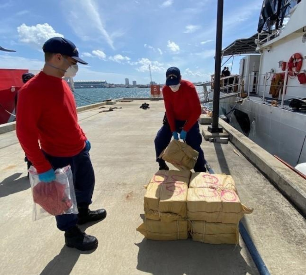 Coast Guard Cutter Heriberto Hernandez crewmembers offload six bales of cocaine, weighing approximately 463 pounds, at Coast Guard Base San Juan April 18, 2022, following the interdiction of a go-fast smuggling vessel near Puerto Rico April 11, 2022. The interdiction is the result of multi-agency efforts involving the Caribbean Border Interagency Group and the Caribbean Corridor Strike Force. (U.S. Coast Guard photo)