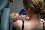 Lt. Kristen Zelman, Sector Anchorage, with her (then) 6-month-old daughter, Brooke, Aug. 5, 2021. Zelman breastfed Brooke for 16 months.