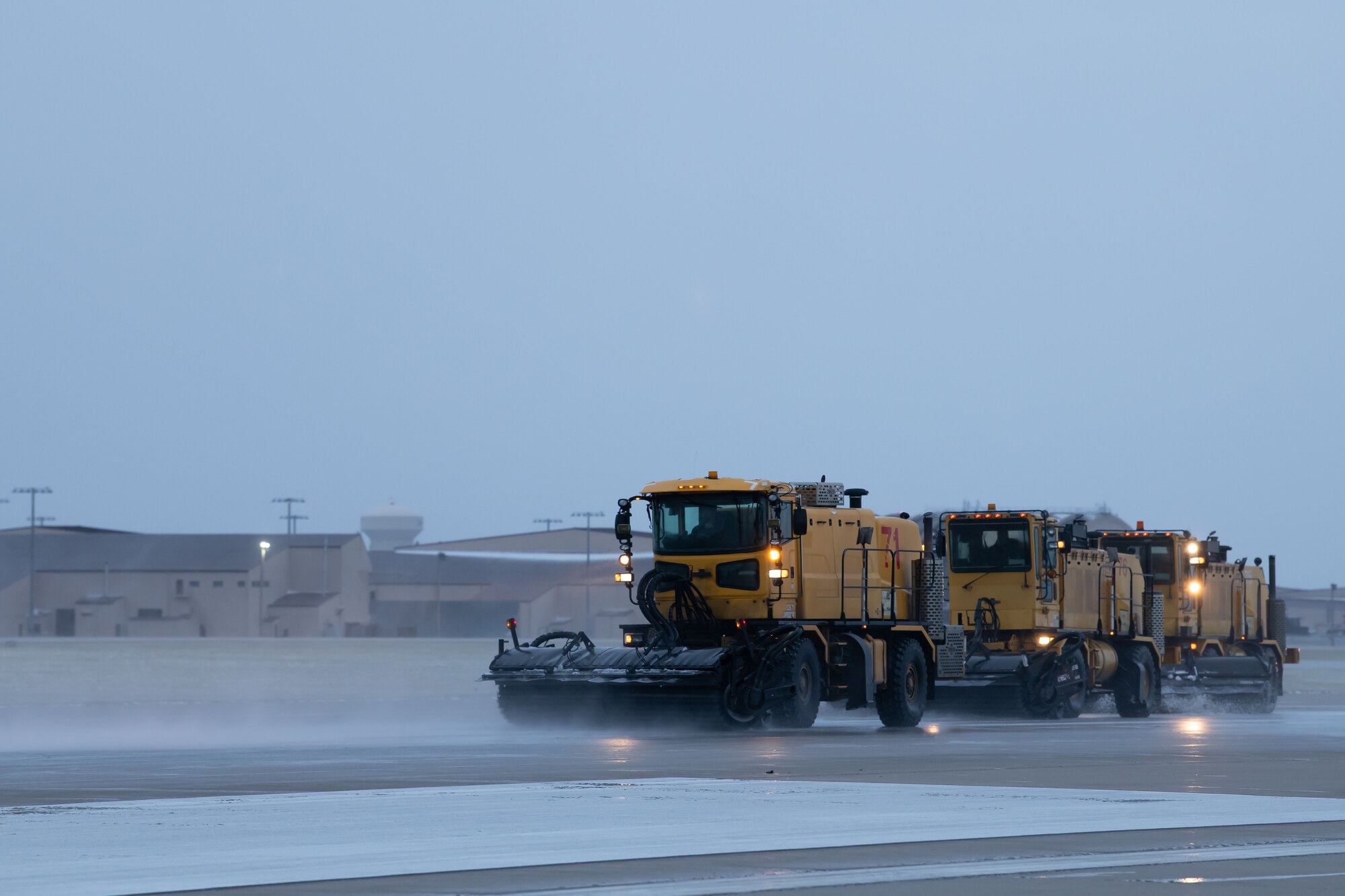 Members of the 28th Civil Engineering Squadron Dirt Boyz drive Oshkosh H-series trucks with front-mounted sweepers to scrub the runway of Ellsworth Air Force Base, S.D., April 24, 2022.
The Dirt Boyz make multiple passes up and down the runway until all dangerous rubber deposits have been removed. (U.S. Air Force photo by Airman 1st Class Adam Olson)