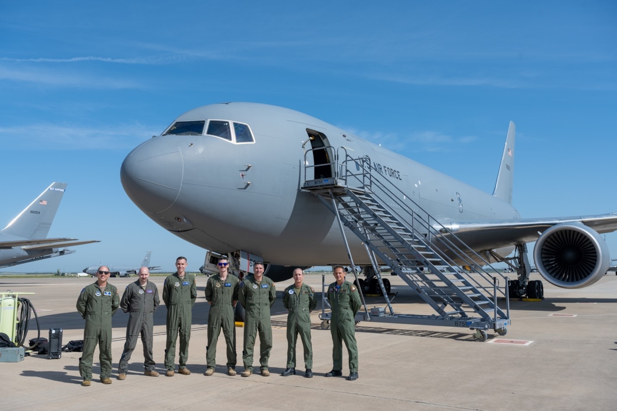 A KC-46A Pegasus crew pose before an orientation flight with Spanish Air Force commanders April 18, 2022 at Morón Air Base, Spain. From left to right: U.S. Air Force Lt. Col. Mark Nexon, Capt. Steven Strickland, Master Sgt. Clay Wonders, Capt. Seth Jackson, Lt. Col. Joshua Moores, Spanish Air Force Col. Enrique Fernandez Ambel, and Spanish Air Force Lt. Col. Ignacio Zulueta Martin. (U.S. Air Force photo by Staff Sgt. Nathan Eckert)