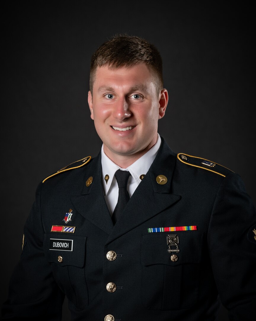 portrait of soldier or airman on a black background, waist up.