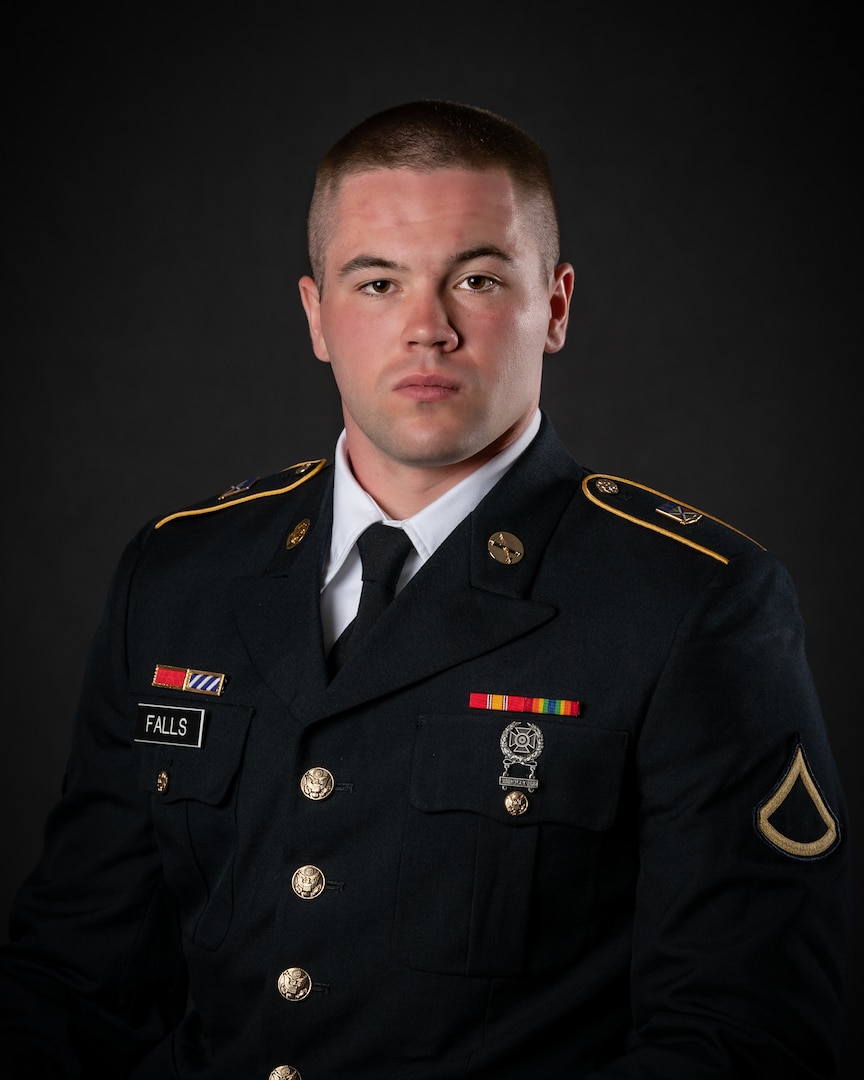 portrait of soldier or airman on a black background, waist up.