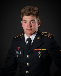 portrait of soldier or airman on a black background, waist up.