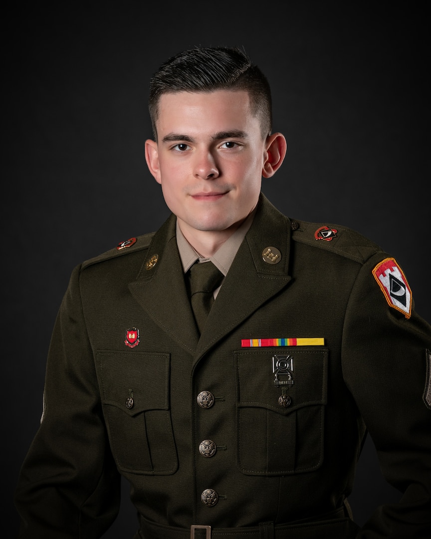 portrait of soldier or airman on a black background, waist up.