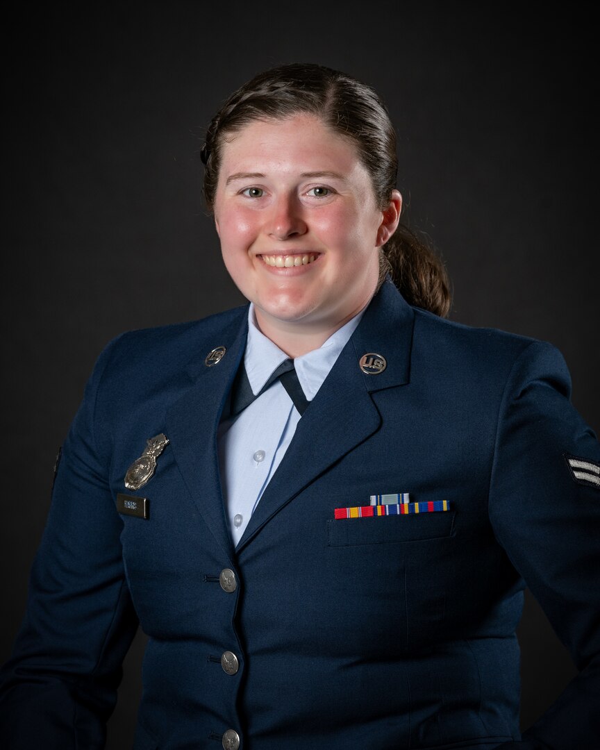 portrait of soldier or airman on a black background, waist up.