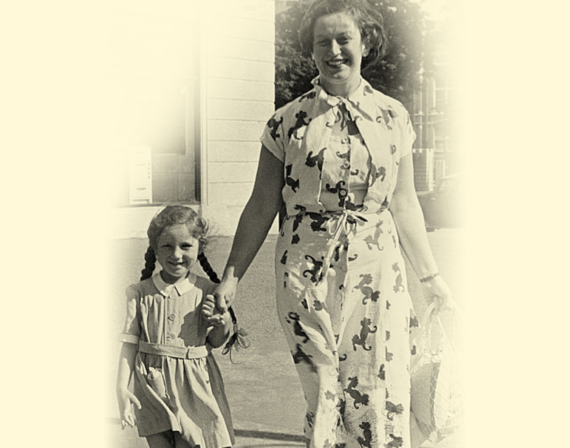 Eva Clarke (aged 5) and her mother, Anka Nathan, walk hand-in-hand in Cardiff in 1950. Eva moved to Cardiff with her mother in 1948, after living with her aunt for three years. Eva’s parents, both Jewish, were kept prisoner for three years by the Germans in concentration camps until the U.S. Army liberated the camps in 1945, just days after Eva was born. (Courtesy photo)