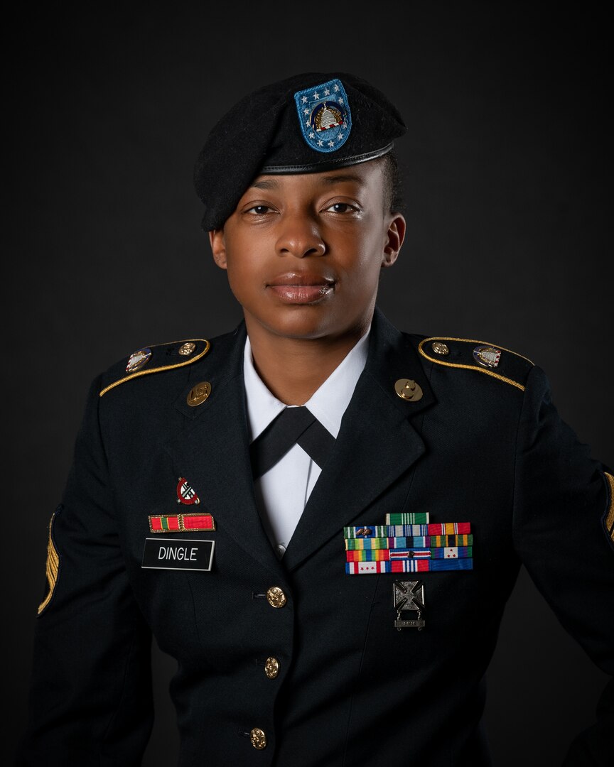 portrait of soldier or airman on a black background, waist up.