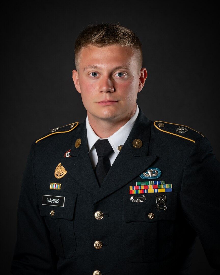 portrait of soldier or airman on a black background, waist up.