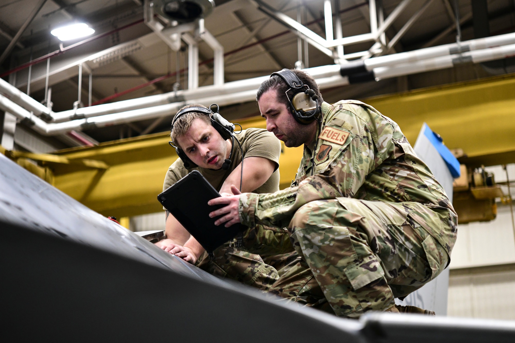 Airmen configure fuel systems.