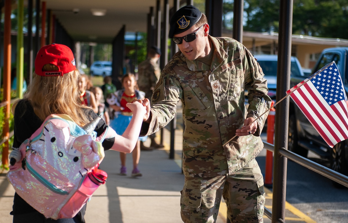 Elementary school children celebrate military child month