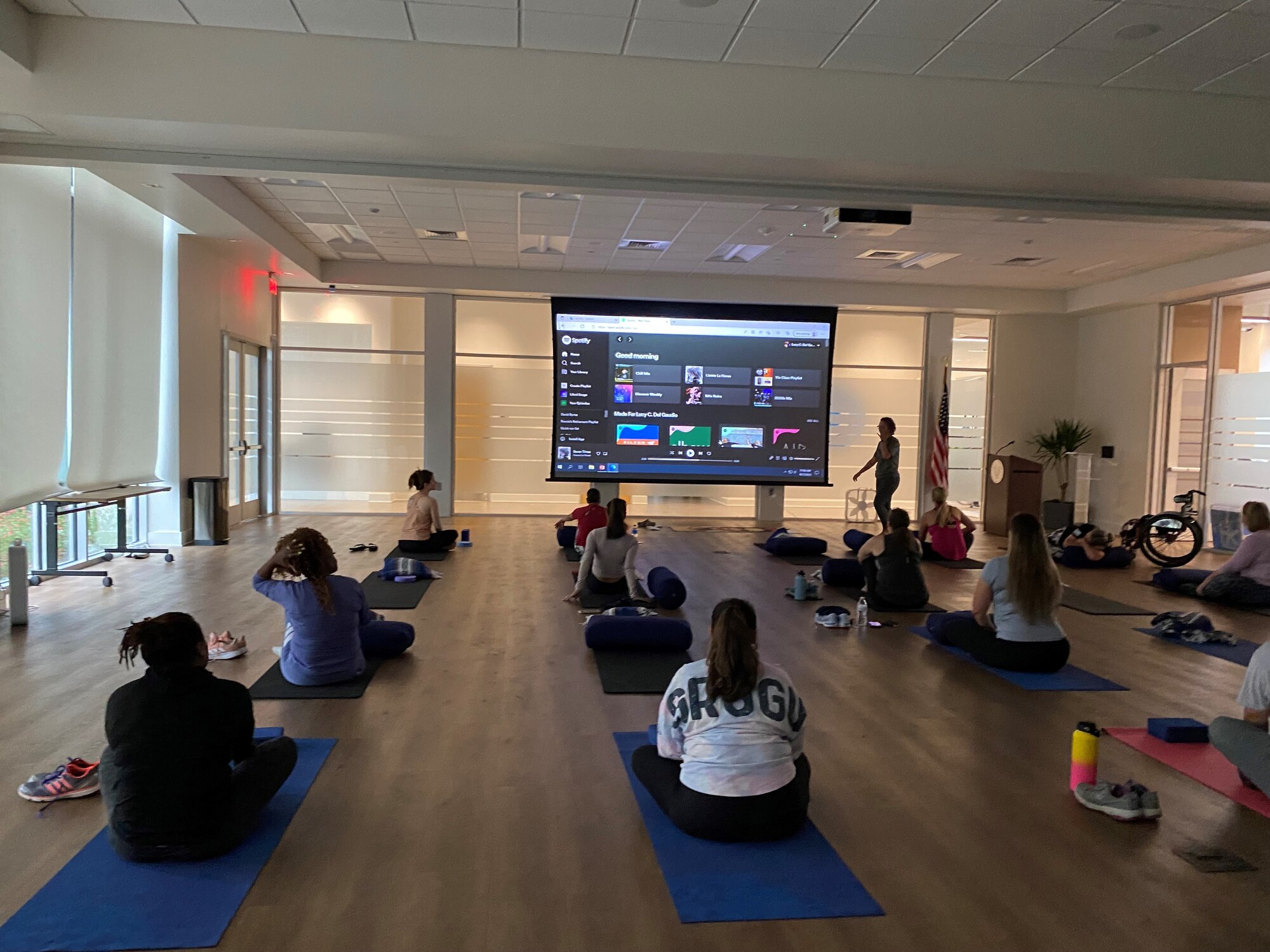 Lucy Del Gaudio, Pink Berets chief operations officer, teaches a mindfulness yoga class to 960th Cyberspace Wing Airmen and families, April 21, 2022, at the Endeavors Veteran Wellness Center, San Antonio. The event was part of a women’s resiliency day in support of Sexual Assault Awareness and Prevention Month. (Courtesy photo)