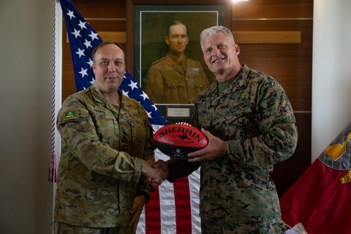 Australian Army Brig. Gen. Nicholas J. Foxall, the commanding officer of 1st Brigade, and U.S. Marine Corps Maj. Gen. Roger B. Turner, the commanding general of 1st Marine Division, pose for a photo at Robertson Barracks, Darwin, NT, Australia, April 21. The 1st MARDIV commanding general visited Marines and Sailors with Marine Rotational Force-Darwin  22 and members of the Australian Defence Force in Darwin to gain insight into MRF-D 22’s current operations and interoperability.