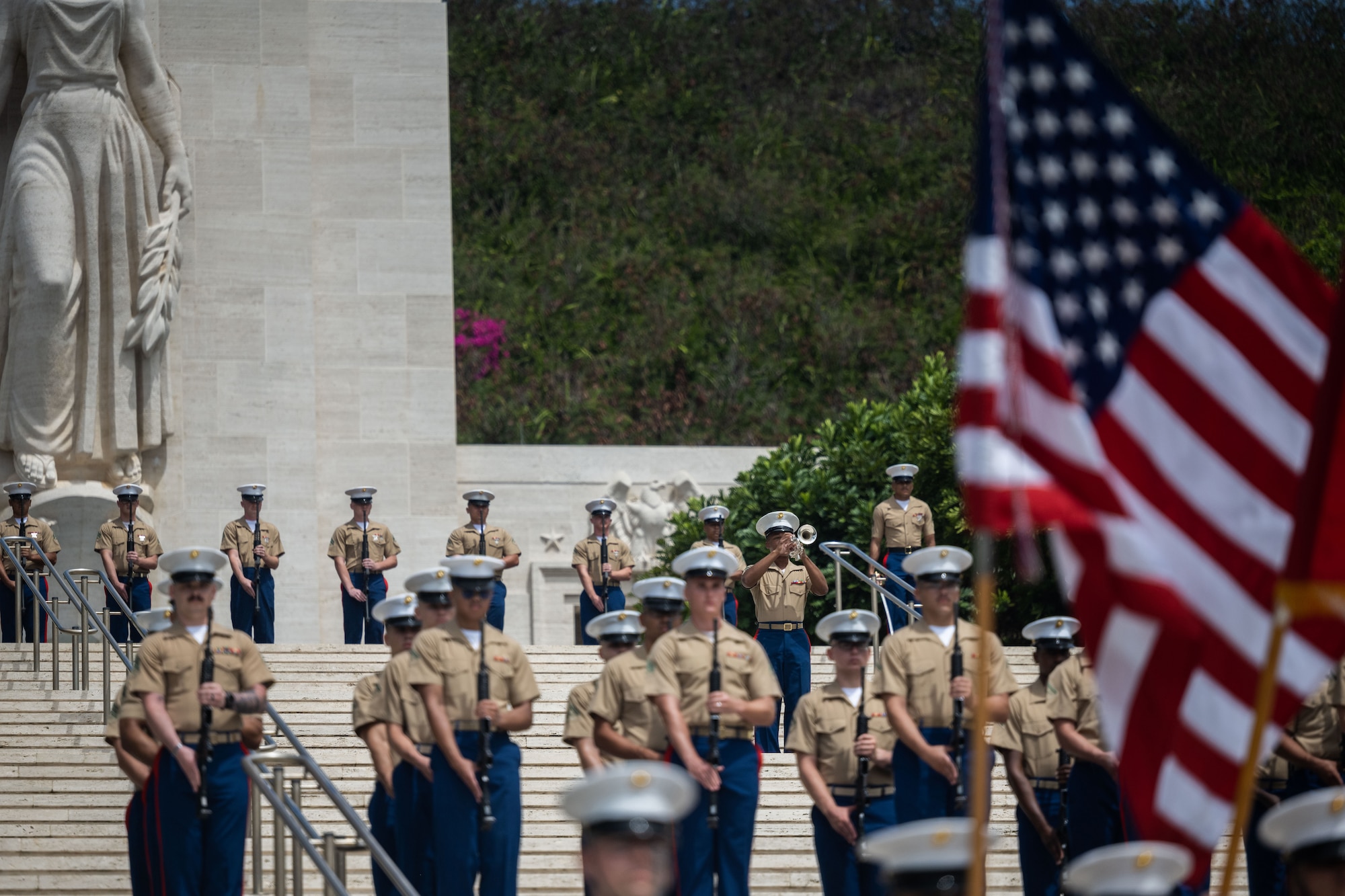 U.S. Marine Corps Sgt. Gregory Jacks (center), U.S. Marine Corps Forces Pacific Band, plays ‘The Last Post’ during Anzac, or Australian and New Zealand Army Corps, Day ceremony at the National Memorial Cemetery of the Pacific, Honolulu, Hawaii, April 25, 2022. Anzac Day has been observed annually in Honolulu since 1973. (U.S. Air Force photo by Tech. Sgt. Hailey Haux)