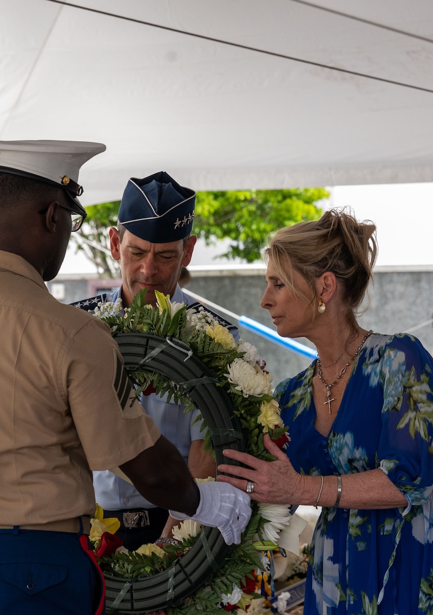 U.S. Air Force Gen. Ken Wilsbach, Pacific Air Forces commander, and Cindy Wilsbach, First Lady of PACAF, prepare to lay a wreath during Anzac, or Australian and New Zealand Army Corps, Day ceremony at the National Memorial Cemetery of the Pacific, Honolulu, Hawaii, April 25, 2022. Anzac Day has been observed annually in Honolulu since 1973. (U.S. Air Force photo by Tech. Sgt. Hailey Haux)