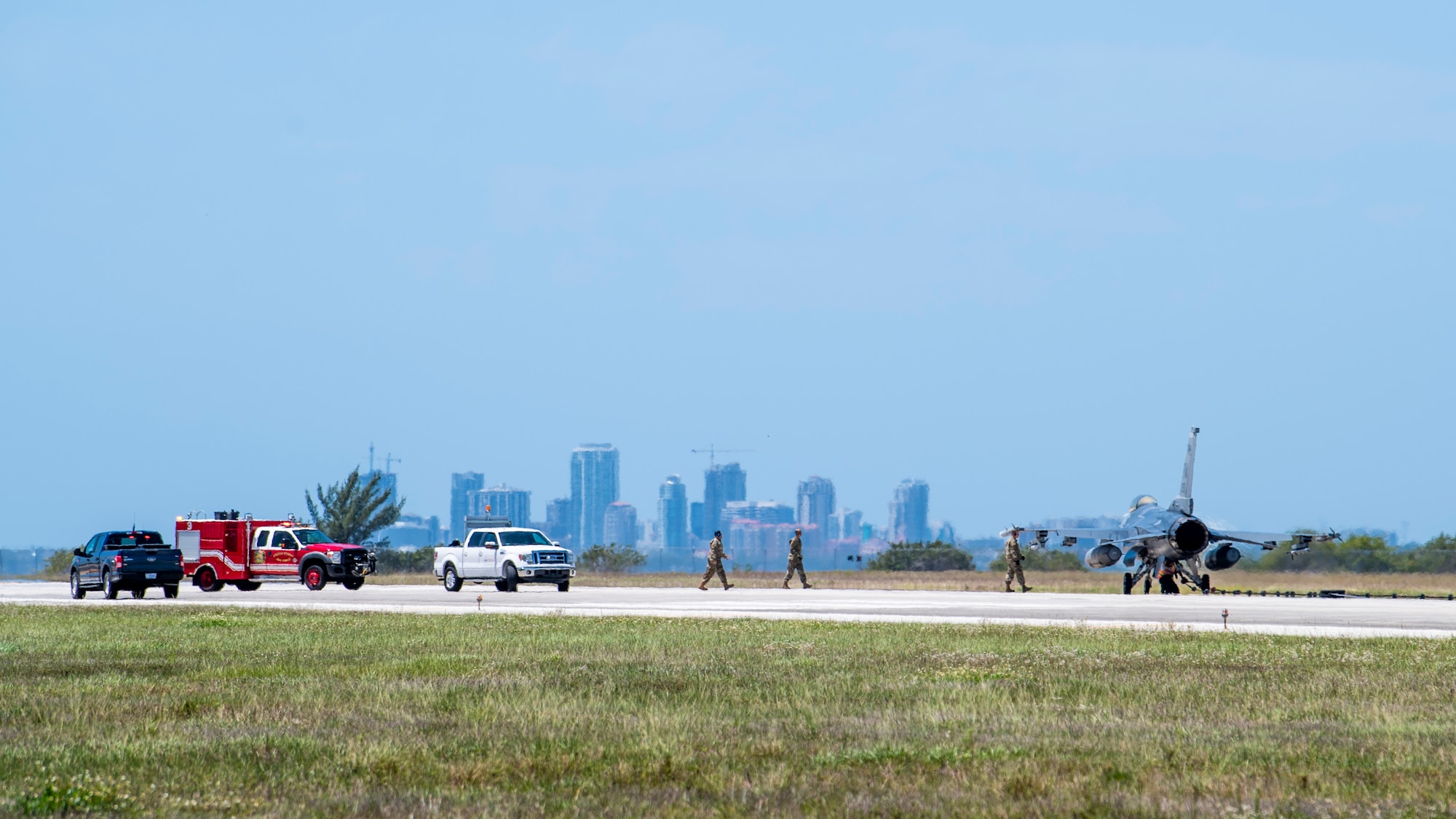 U.S. Airmen with the 6th Civil Engineer Squadron respond to an F-16C Fighting Falcon from the 482nd Fighter Wing, Homestead Air Reserve Base, Florida, after testing a Bak-12 aircraft arresting system at MacDill Air Force Base, Florida, April 22, 2022.