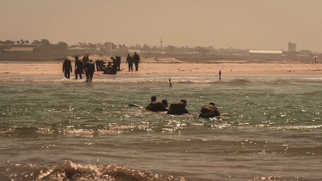 U.S. Marines with 7th Engineer Support Battalion, traverse a delta during a squad competition, at Marine Corps Base Camp Pendleton, Sep. 10, 2021. The Marines participated in the squad competition in remembrance of those effected by the 9/11 attacks. Throughout the competition, Marines were faced with obstacles intended to test the logistical warfighting capabilities of the unit. (U.S. Marine Corps photo by Cpl. William Redding)