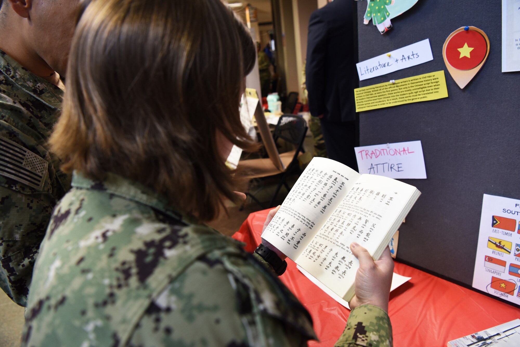 Joint service members assigned to the 17th Training Wing visited different language booths at the Goodfellow AFB and Angelo State University Language and Culture Fair, April 26, 2022, San Angelo, Texas. Each booth featured interactive elements for visitors to learn the cultures and languages found across the globe. (U.S. Air Force photo by Senior Airman Michael Bowman)