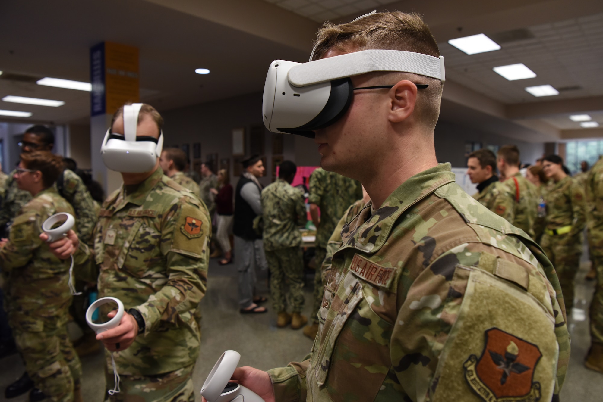 U.S. Air Force Airman 1st Class Byron Waldins, 316th Training Squadron student, tests a virtual reality experience during the Goodfellow AFB and Angelo State University Language and Culture Fair, April 26, 2022, San Angelo, Texas. The VR experience was developed by 517th Training Group members to provide innovative Department of Defense language training. (U.S. Air Force photo by Senior Airman Michael Bowman