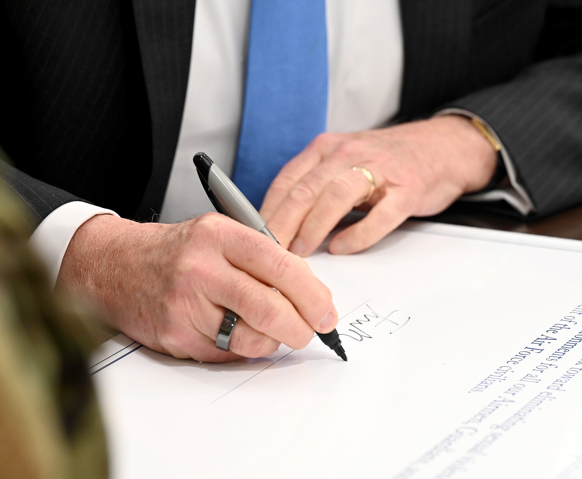 Secretary of the Air Force Frank Kendall signs a Sexual Assault and Prevention Month proclamation in the Pentagon, Arlington, Va., April 27, 2022. (Air Force Photo by Andy Morataya)