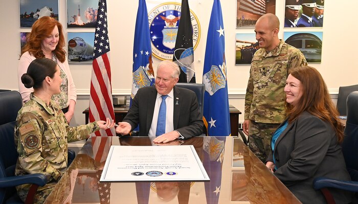 Secretary of the Air Force Frank Kendall signs a Sexual Assault and Prevention Month proclamation in the Pentagon, Arlington, Va., April 27, 2022. (U.S. Air Force Photo by Andy Morataya)