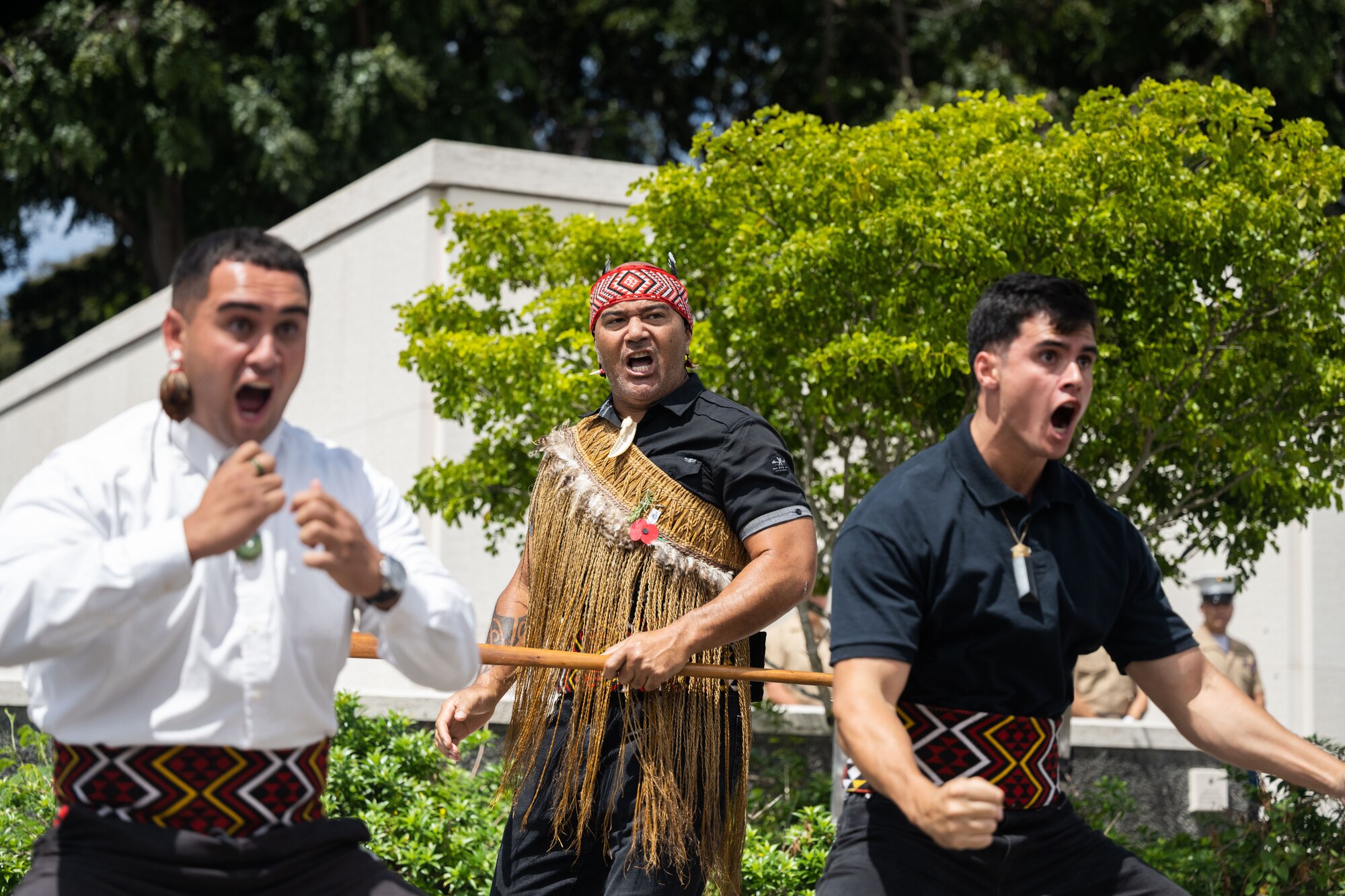 A group from the Polynesian Cultural Center perform the Haka in honor of Anzac, or Australian and New Zealand Army Corps, Day at the National Memorial Cemetery of the Pacific, Honolulu, Hawaii, April 25, 2022. The Haka is a ceremonial Māori war dance or challenge usually performed in a group and represent a display of a tribe's pride, strength and unity. (U.S. Air Force photo by Tech. Sgt. Hailey Haux)