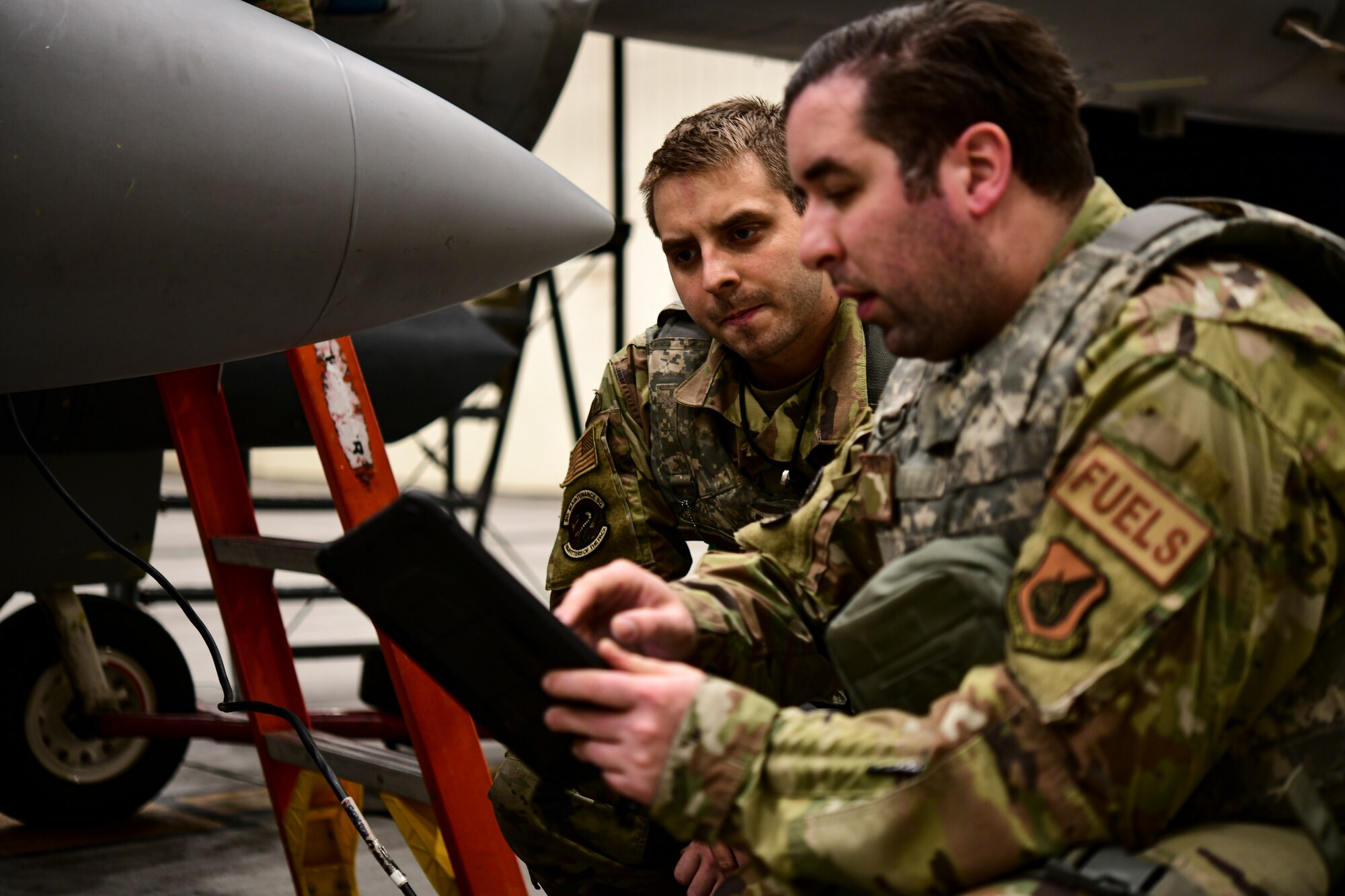 Airmen configure fuel systems.