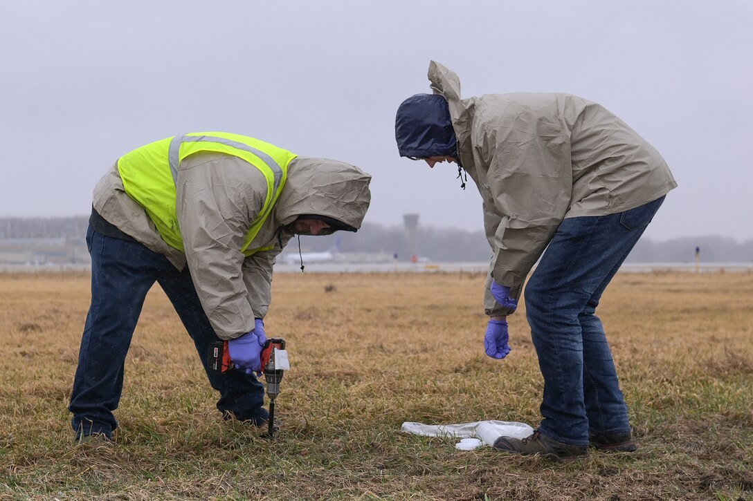 Drillers with Plains Environmental Services, Inc. conduct hydraulic profiling and electrical conductivity testing using a Geoprobe mobile drilling rig during a remedial investigation into the presence of Per- and Polyfluoroalkyl substances at Truax Field in Madison, Wisconsin, March 22, 2022. (U.S. Air National Guard photo by Senior Master Sgt. Paul Gorman)