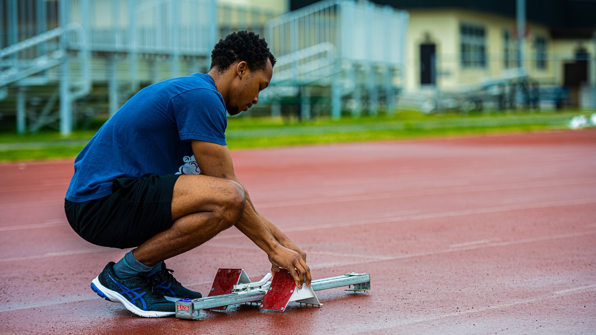 participant prepares block during a track competition.
