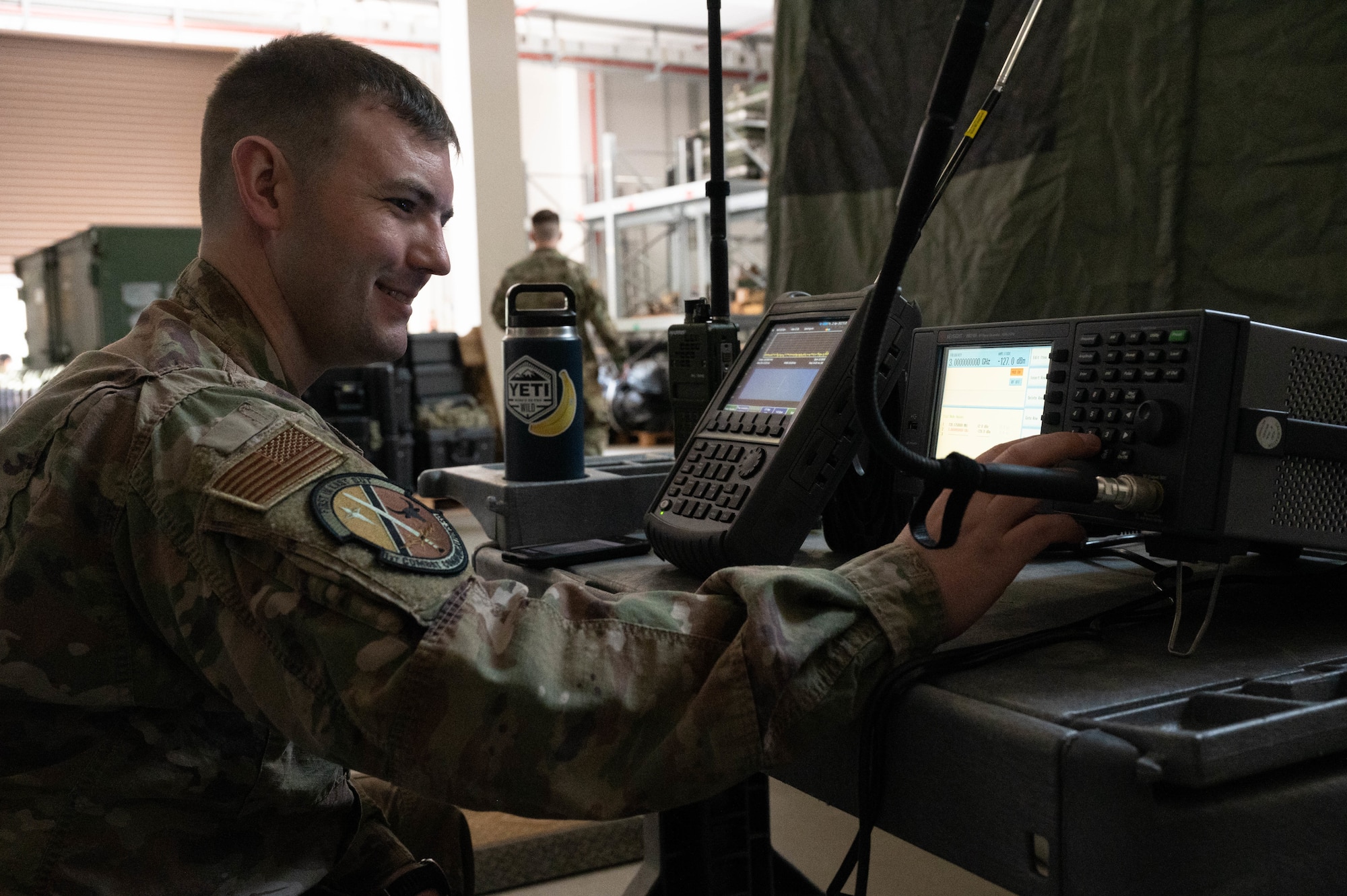 An Airman simulates jamming scenarios.