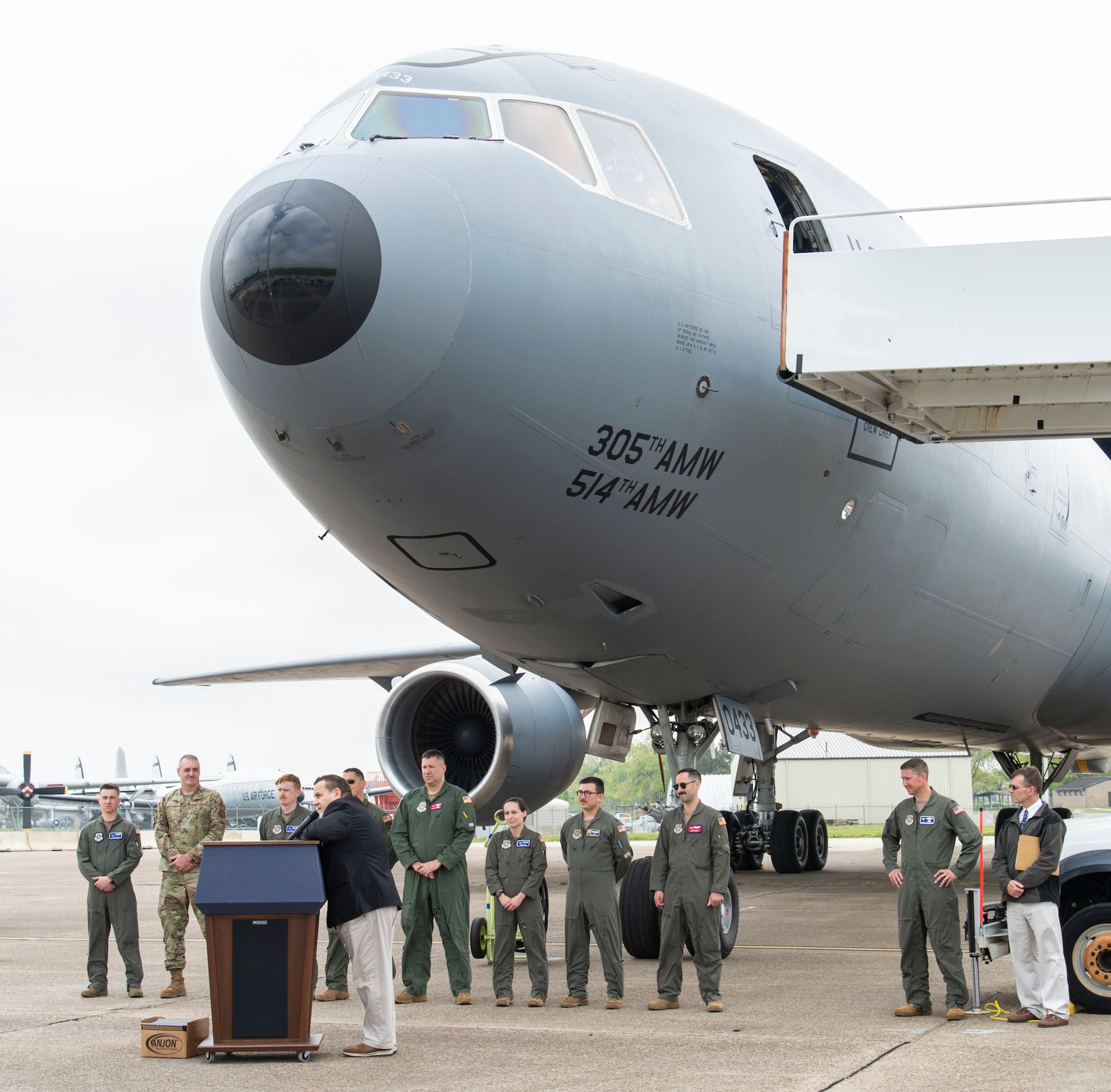 John Taylor, Air Mobility Command Museum director, recognizes aircrew from the 305th Air Mobility Wing and 32nd Air Refueling Squadron, Joint Base McGuire-Dix-Lakehurt, New Jersey, at the retirement ceremony of a KC-10A Extender at the AMC Museum on Dover Air Force Base, Delaware, April 26, 2022. This particular aircraft was the first of 60 Extenders that entered the U.S. Air Force inventory. The aircraft will become the 36th addition to the AMC Museum. (U.S. Air Force photo by Roland Balik)