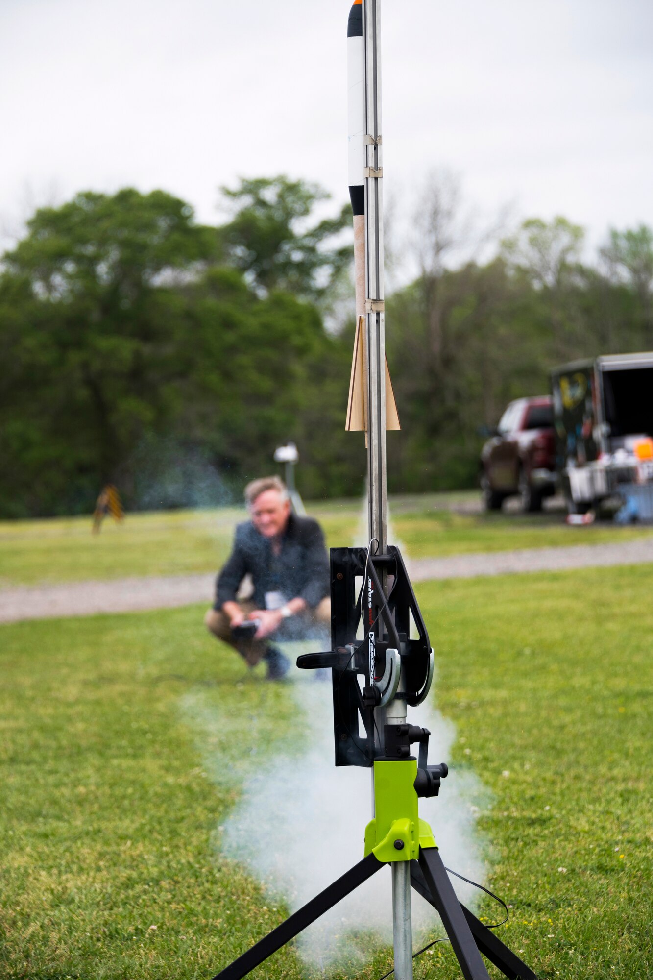 Man launching a model rocket