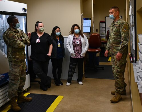 The 30th Medical Group Diagnostic and Therapeutics Flight waits for the group meeting to begin in the pharmacy at Vandenberg Space Force Base, Calif., April 13, 2022. The pharmacy technicians and pharmacists prepared for their meeting to talk about the weekly events. (U.S. Space Force photo by Airman 1st Class Tiarra Sibley)