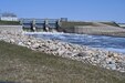 Water is released into the Sheyenne River through three Tainter gates at Baldhill Dam