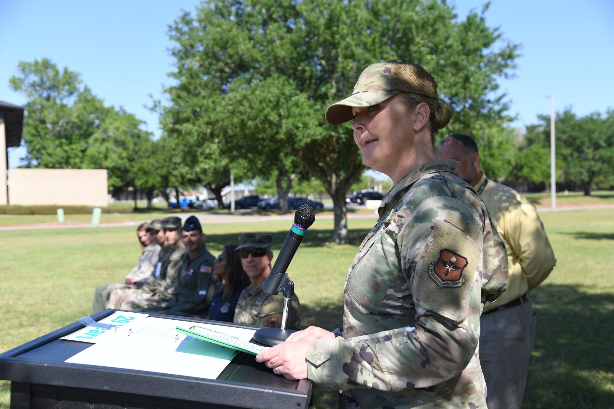 U.S. Air Force Chief Master Sgt. Sarah Esparza, 81st Training Wing command chief, reads the Arbor Day proclamation to a preschool class at the Keesler Child Development Center during the Arbor Day Celebration at Keesler Air Force Base, Mississippi, April 28, 2022. A tree planting ceremony and a Tree City USA flag presentation also took place at the event. (U.S. Air Force photo by Kemberly Groue)