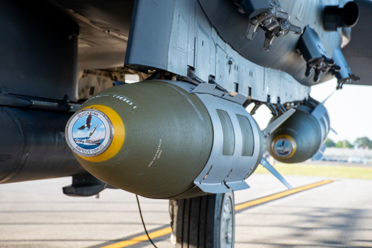The Air Force Research Laboratory partnered with the 780th Test Squadron of the 96th Test Wing and the 85th Test and Evaluation Squadron of the 53rd Wing to equip an F-15E Strike Eagle at Eglin Air Force Base, Fla. with modified 2,000-pound GBU-31 Joint Direct Attack Munitions as part of the second test in the QUICKSINK Joint Capability Technology Demonstration. QUICKSINK, a new low-cost, air-delivered capability for defeating maritime threats, successfully destroyed a full-scale stationary surface vessel April 28, 2022, as part of a demonstration in the Gulf of Mexico. (U.S. Air Force photo / 1st Lt Lindsey Heflin)
