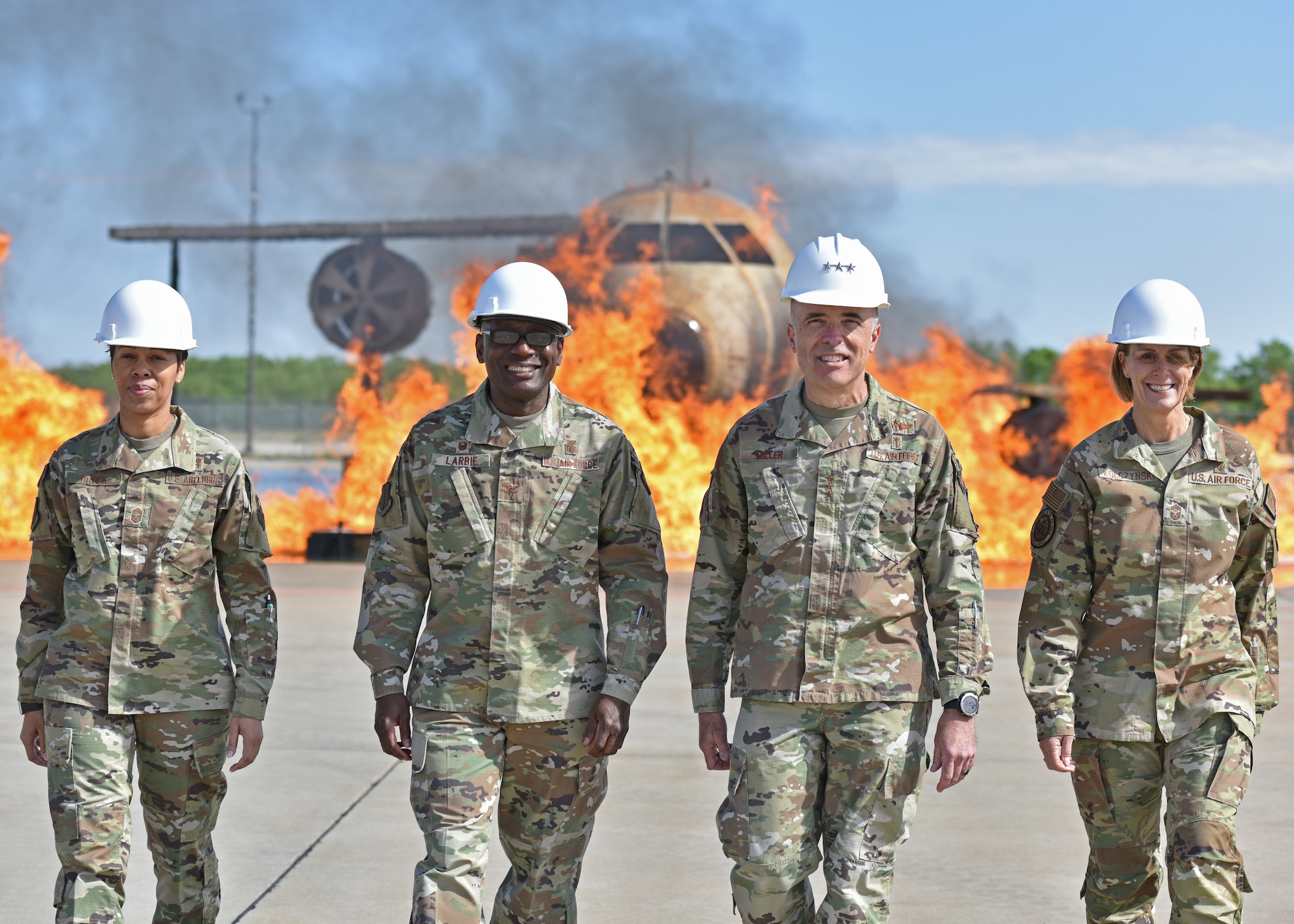 U.S. Air Force Surgeon General Lt. Gen. Robert Miller; Chief Master Sgt. Dawn Kolczynski, Chief, Medical Enlisted Force and Enlisted Corps Chief; and 17th Medical Group leadership pose for a photo at Goodfellow Air Force Base, Texas, April 26, 2022. The 17th MDG leadership welcomed Miller and Kolczynski to experience the 17th Training Wing mission. (U.S. Air Force photo by Senior Airman Ashley Thrash)