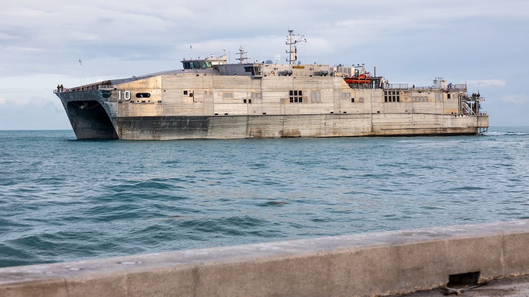 The expeditionary fast transport vessel USNS Burlington (T-EPF-10) departs the pier during a fleet experimentation period with scientists from various research and development agencies and U.S. Naval Forces Southern Command/U.S. 4th Fleet.