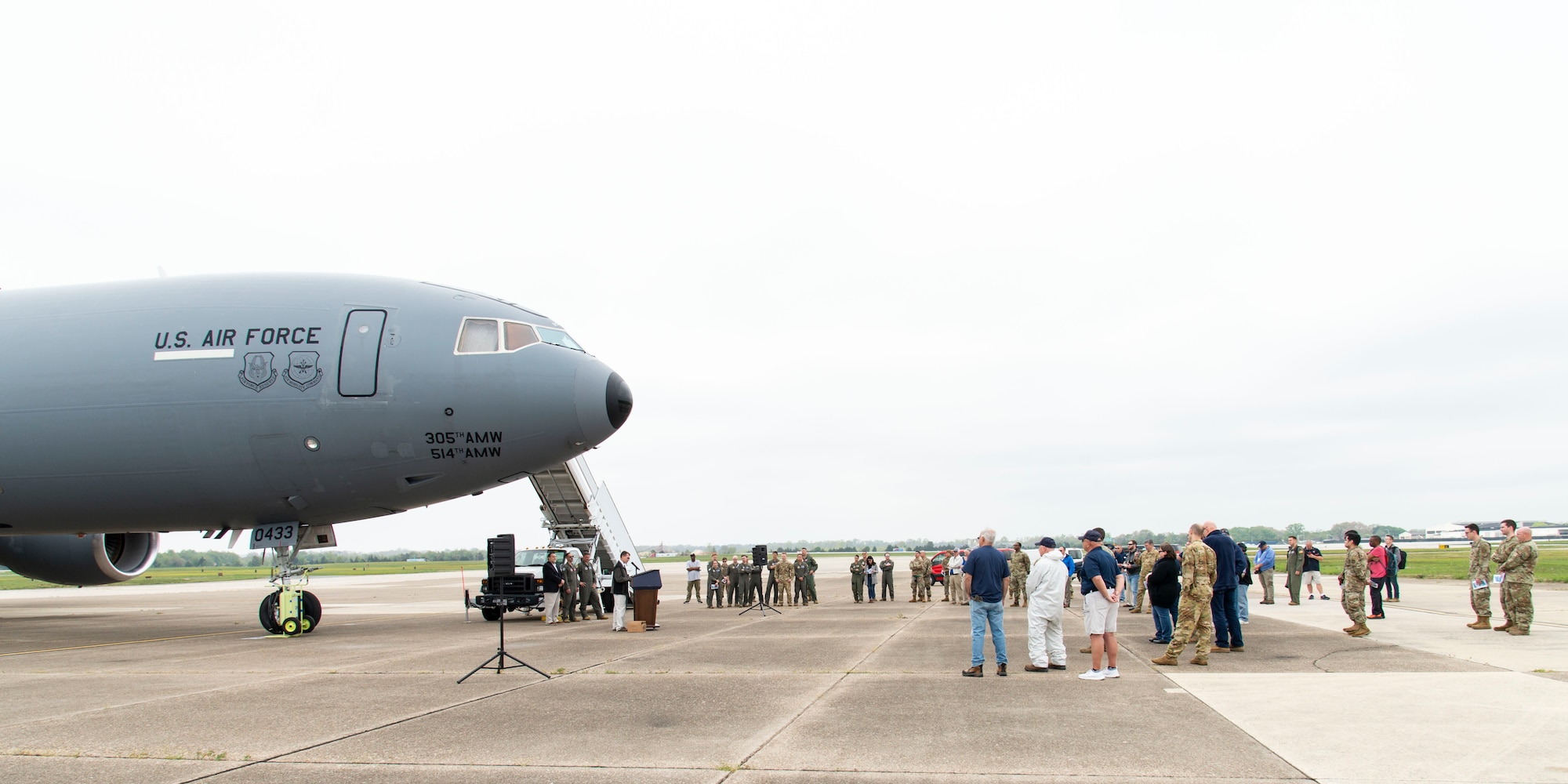 Attendees listen to guest speakers during a KC-10A Extender retirement ceremony at the Air Mobility Command Museum on Dover Air Force Base, Delaware, April 26, 2022. This particular aircraft was the first of 60 Extenders that entered the U.S. Air Force inventory. The aircraft was retired to Dover AFB from Joint Base McGuire-Dix-Lakehurst, New Jersey, to become the 36th addition to the AMC Museum. (U.S. Air Force photo by Roland Balik)