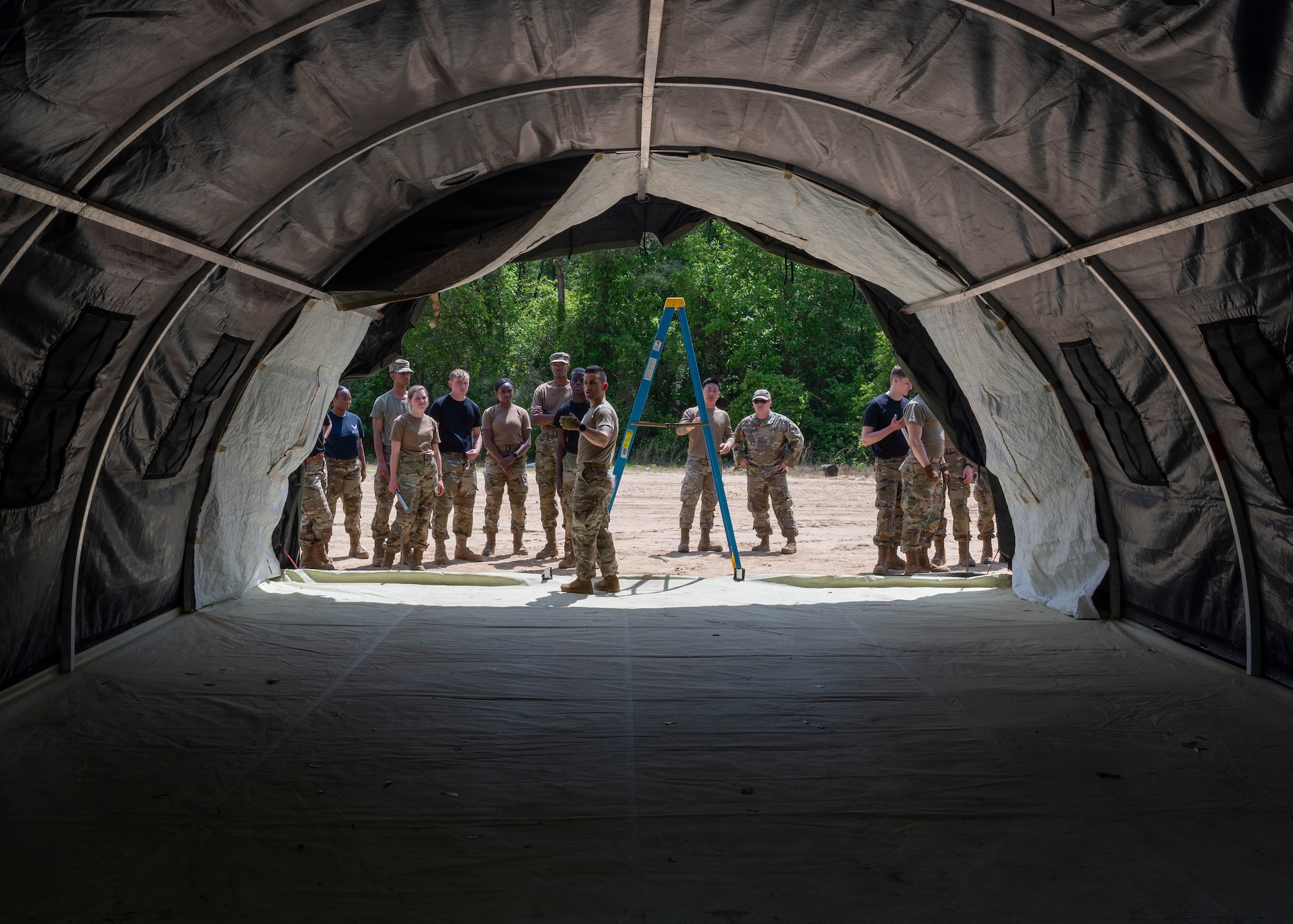 Air Force ROTC cadets from North Carolina Agricultural and Technical State University Det. 605, assemble a small shelter system during field day training at Seymour Johnson Air Force Base, North Carolina, April 21, 2022.