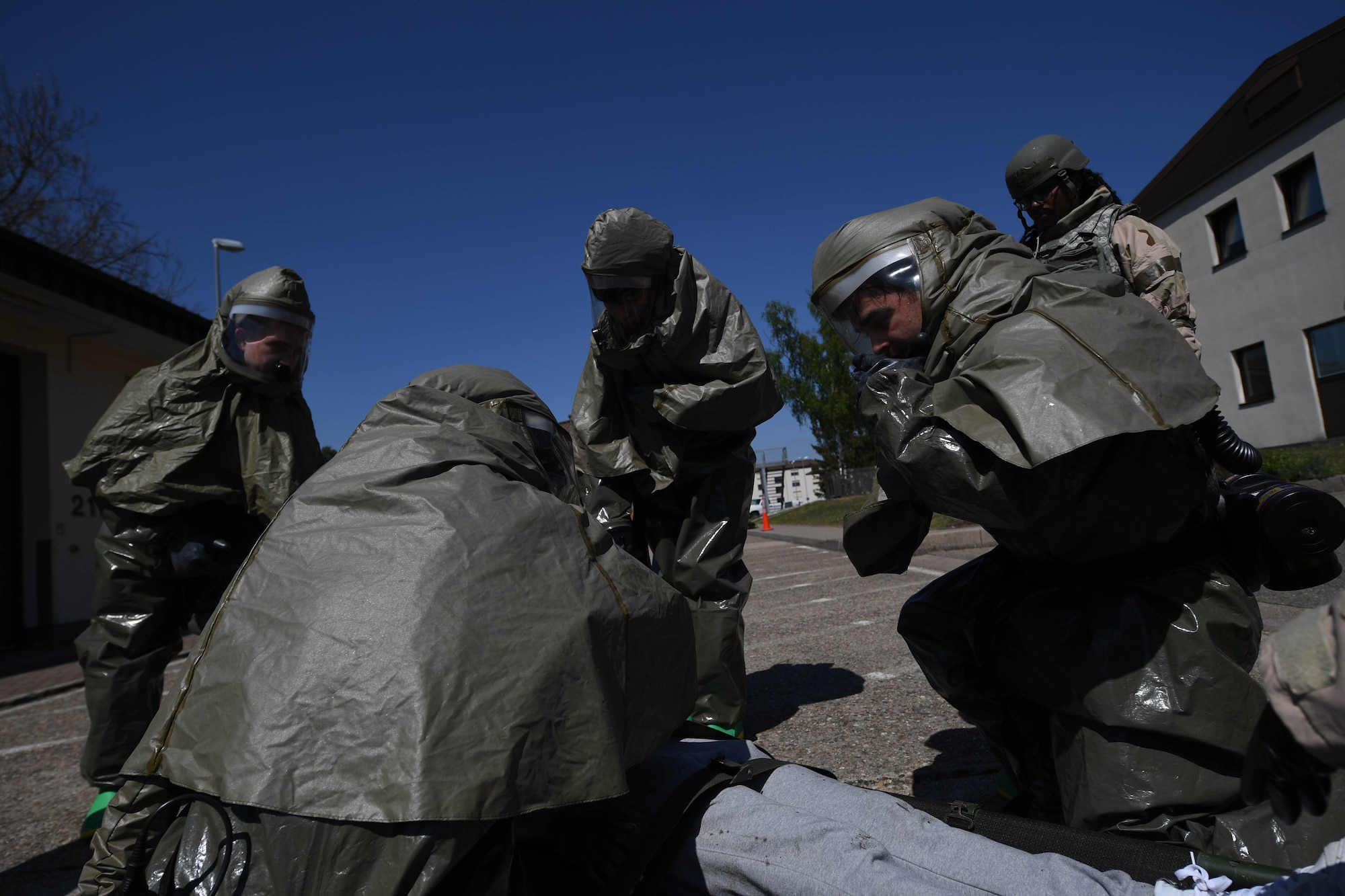 Airmen triage an unconscious patient.