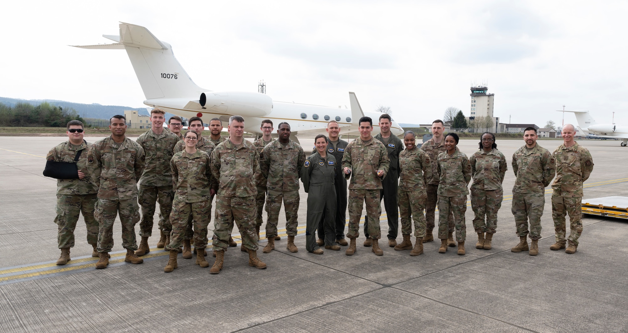 Airman 1st Class Francisco Castillo, 86th Operations Support Squadron Aircrew Flight Equipment apprentice, stands with team members for a photo at Ramstein Air Base, Germany, April 14, 2022. Castillo earned the title of Airlifter of the Week because of his can-do attitude and credited his success to his teammates. (U.S. Air Force photo by Senior Airman Thomas Karol)