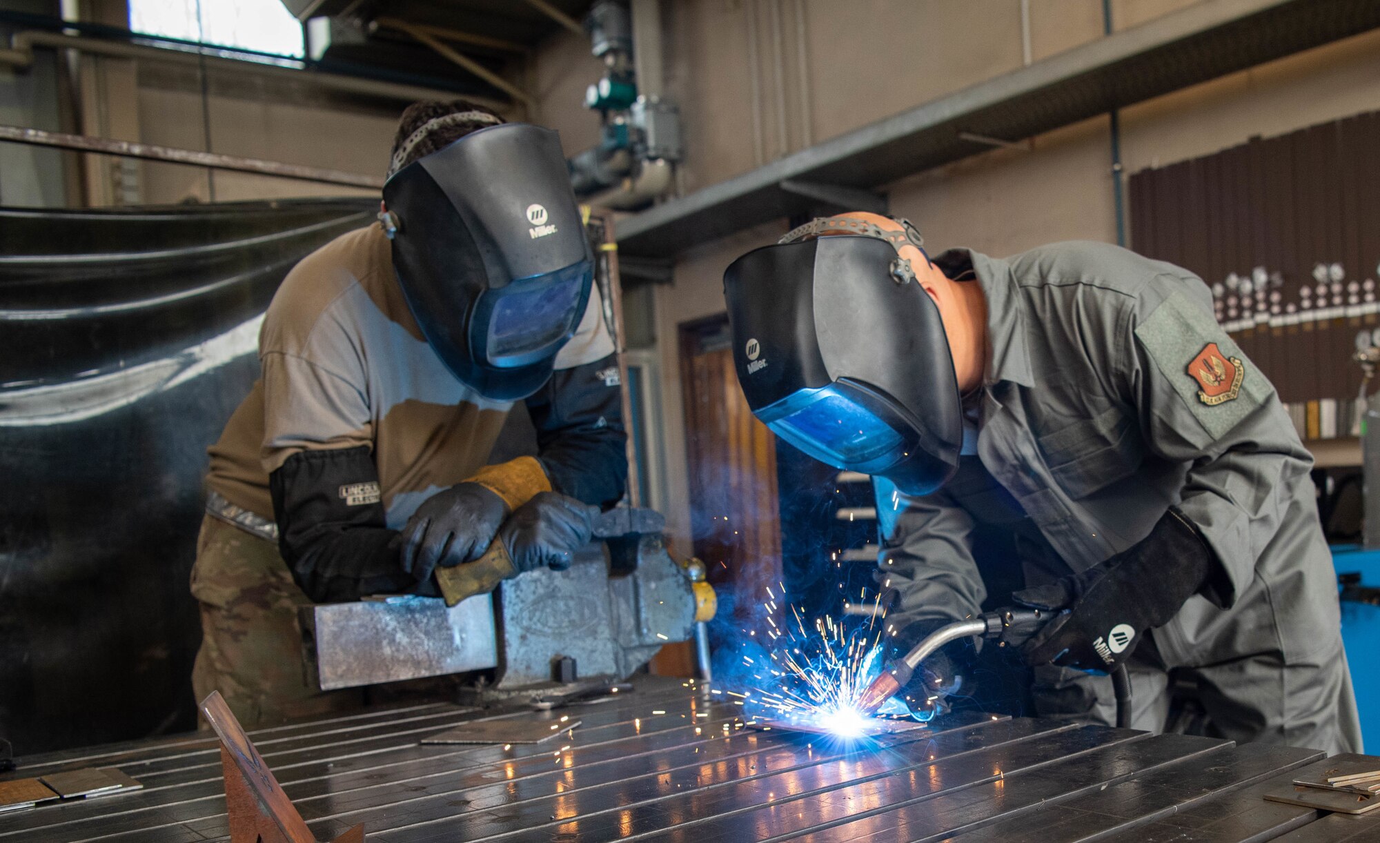 Man uses welding machine