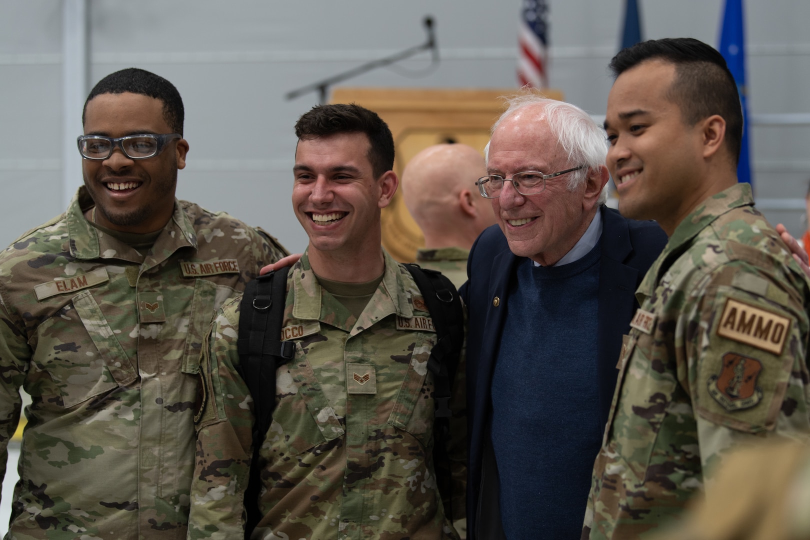 Vermont Senator Bernie Sanders poses with members of the 158th Fighter Wing and their families during a deployment ceremony at the Vermont Air National Guard Base, South Burlington, Vermont, Thursday, April 28th, 2022. The ceremony recognizes the sacrifices of Airmen and their families ahead of the 158th fighter wing’s deployment to Europe. (U.S. Air Force photo by Tech. Sgt. Richard Mekkri)